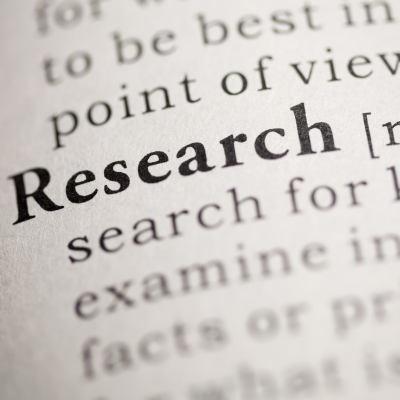 The word research is highlighted in a dictionary to indicate New Research on Using Labor Market Data in Higher Education to drive decisions about what to teach in classrooms.